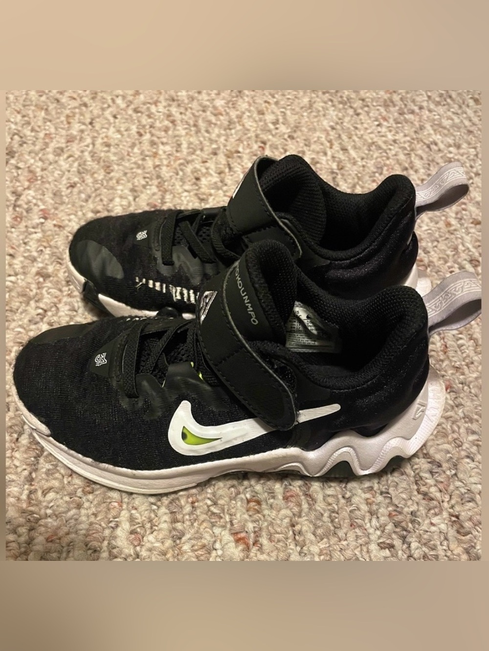 Nike Kids Black Sneakers with White Swoosh and Neon Green Accent